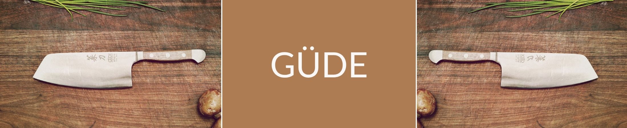 Güde Banner mit 2 verschiedenen Messer Motiven auf einem Holztisch